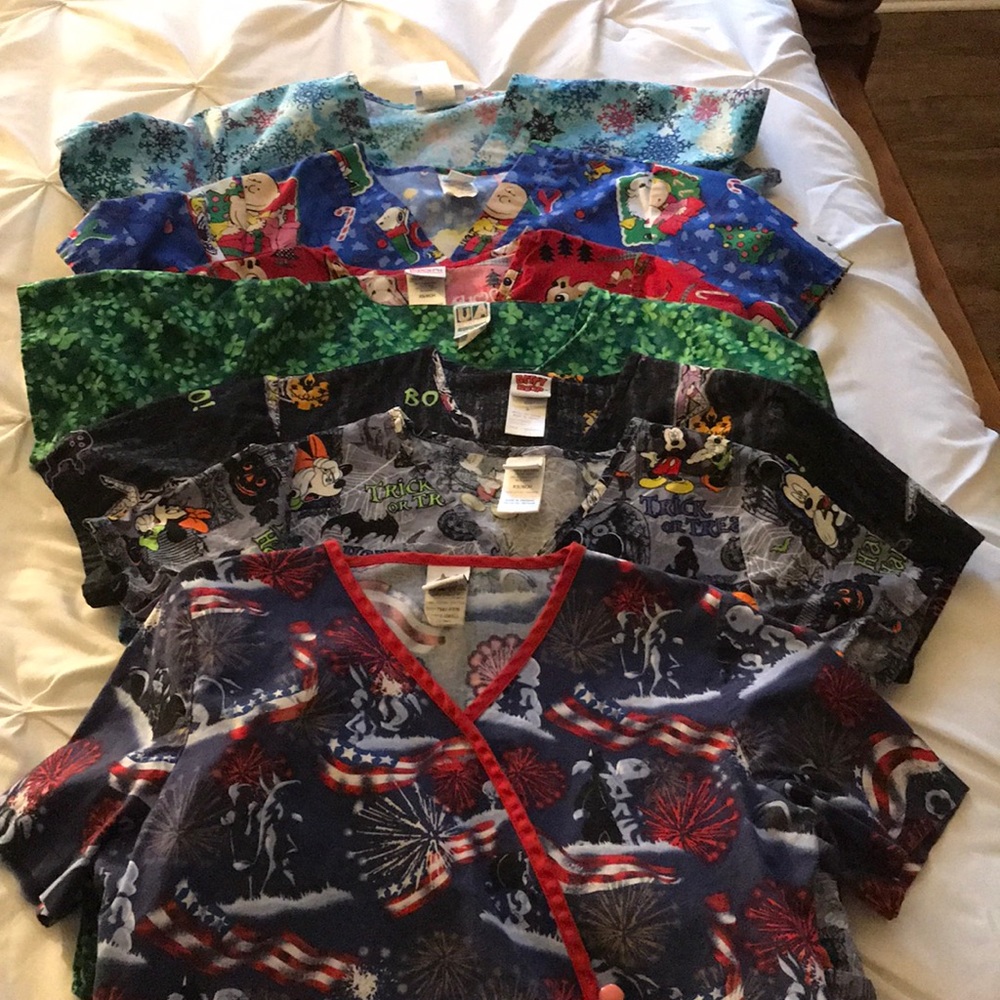 Variety of comfy, printed holiday scrub tops.